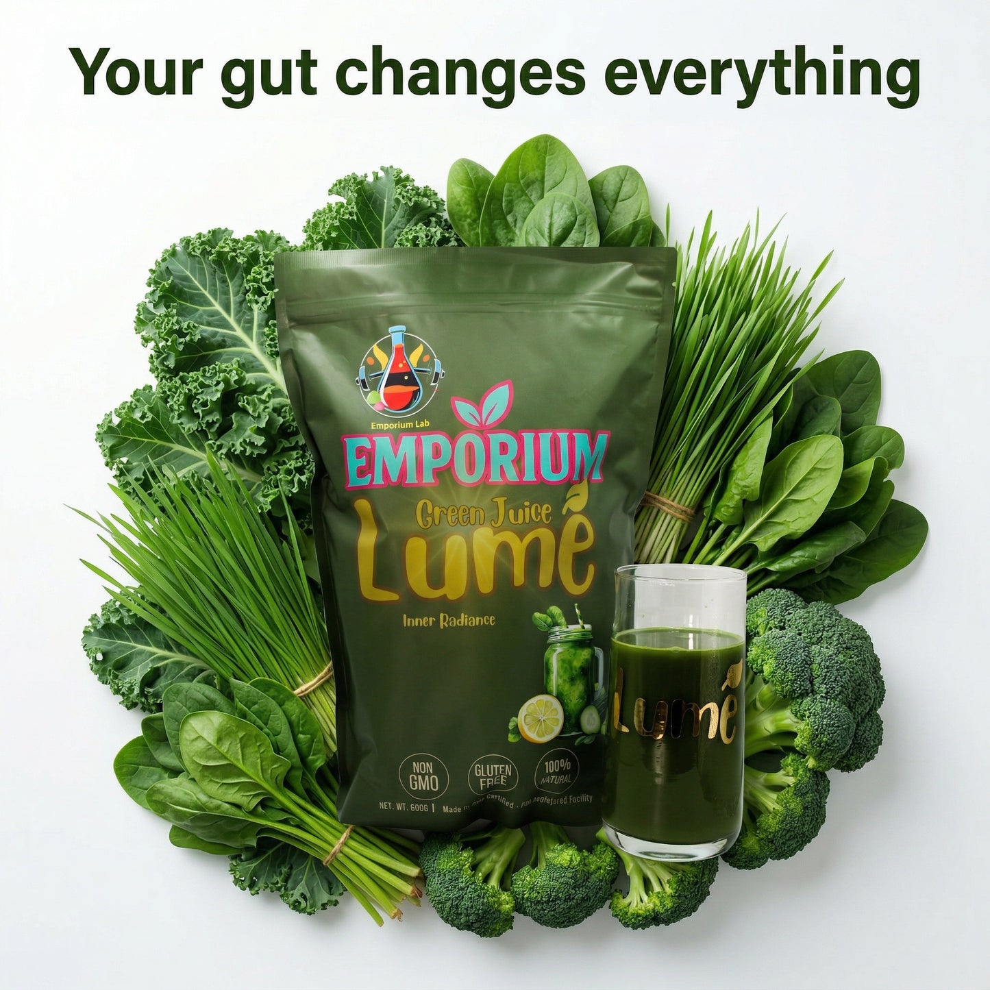 Emporium Lume package surrounded by green vegetables with a glass of juice on a white background.