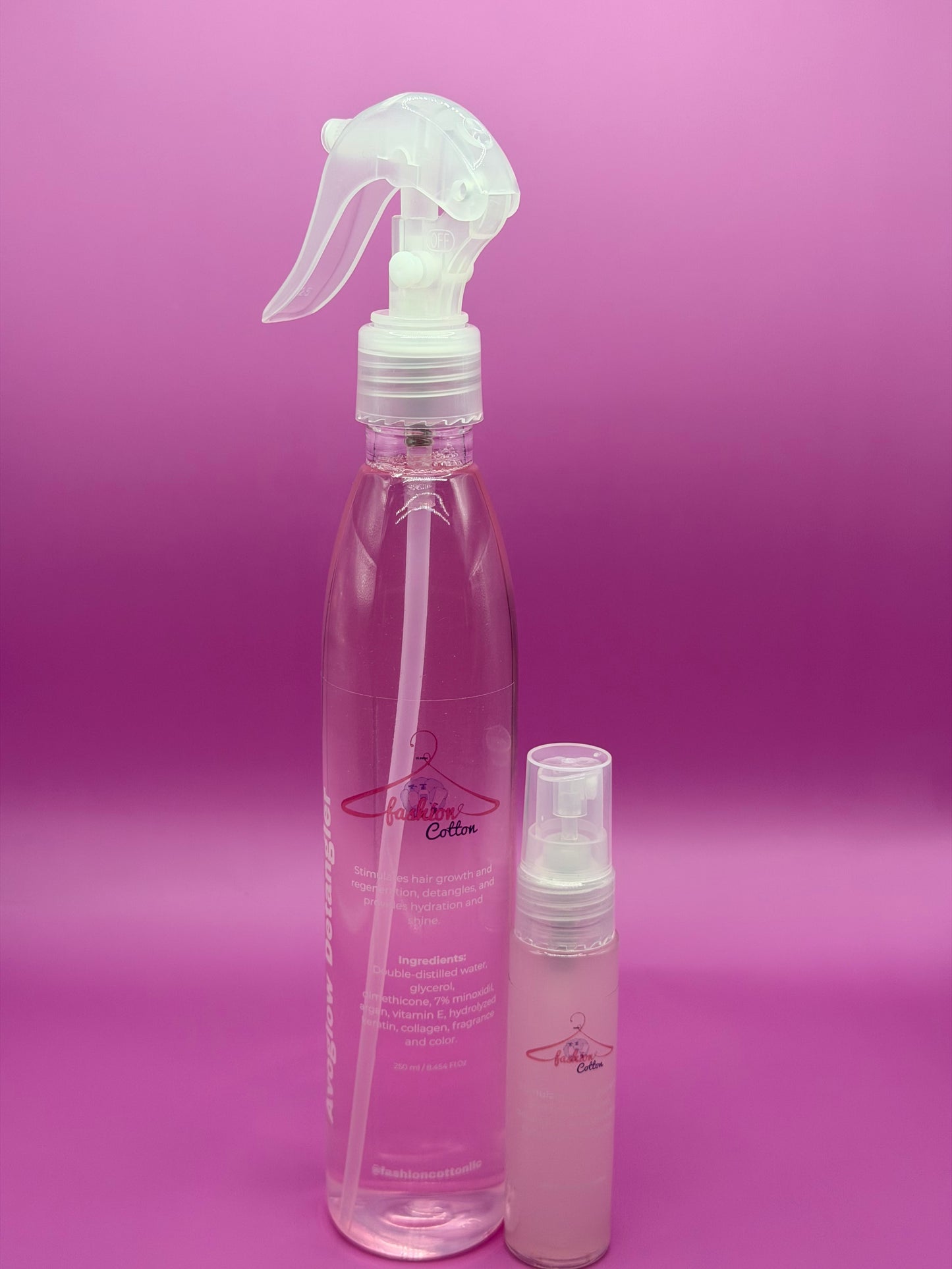 Two spray bottles on a purple background